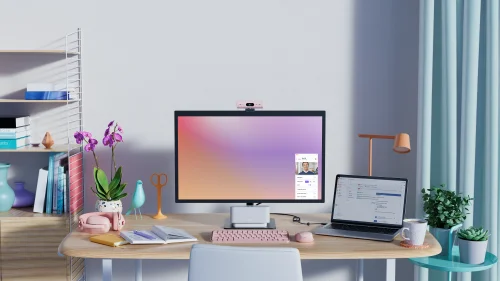 Stanowisko pracy z monitorem, laptopem i akcesoriami Logitech